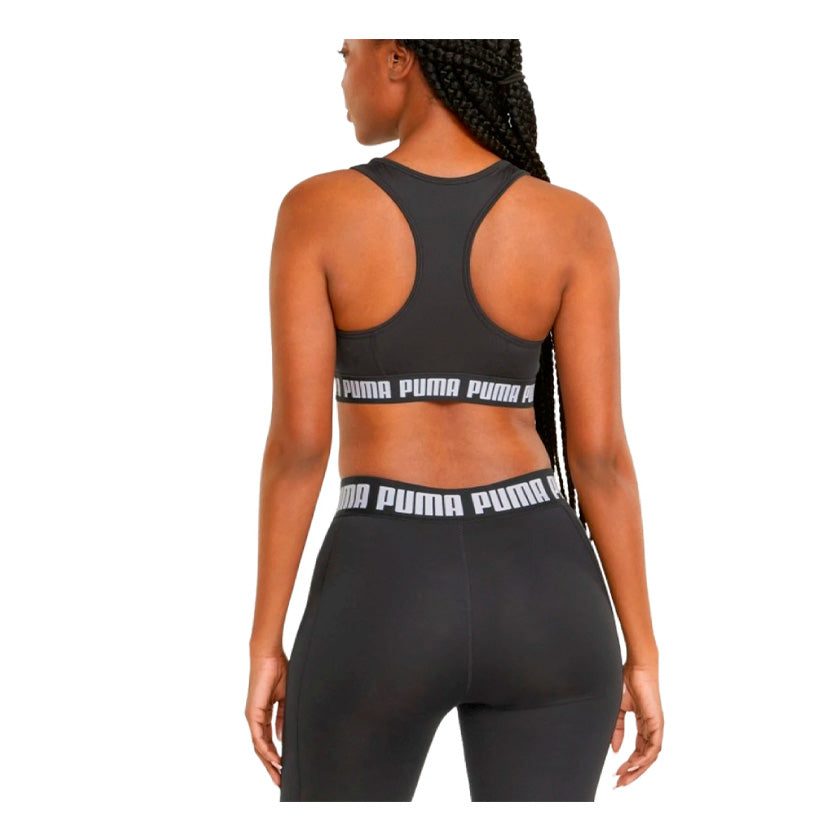 Top Puma Mid Impact Strong Bra 521598 01 para mujer de color negro con blanco de uso para entrenamiento
